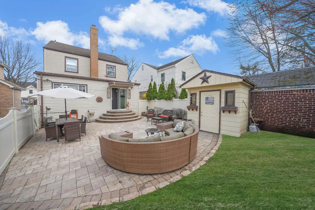 Colonial 3-Bedroom Home with Finished Basement and Detached Garage (1,920 Sq. Ft. Floor Plan)