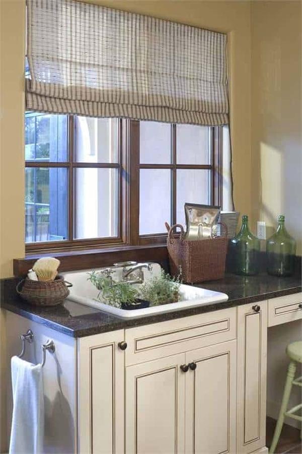 Charming Kitchen Nook with a Practical Farmhouse Sink