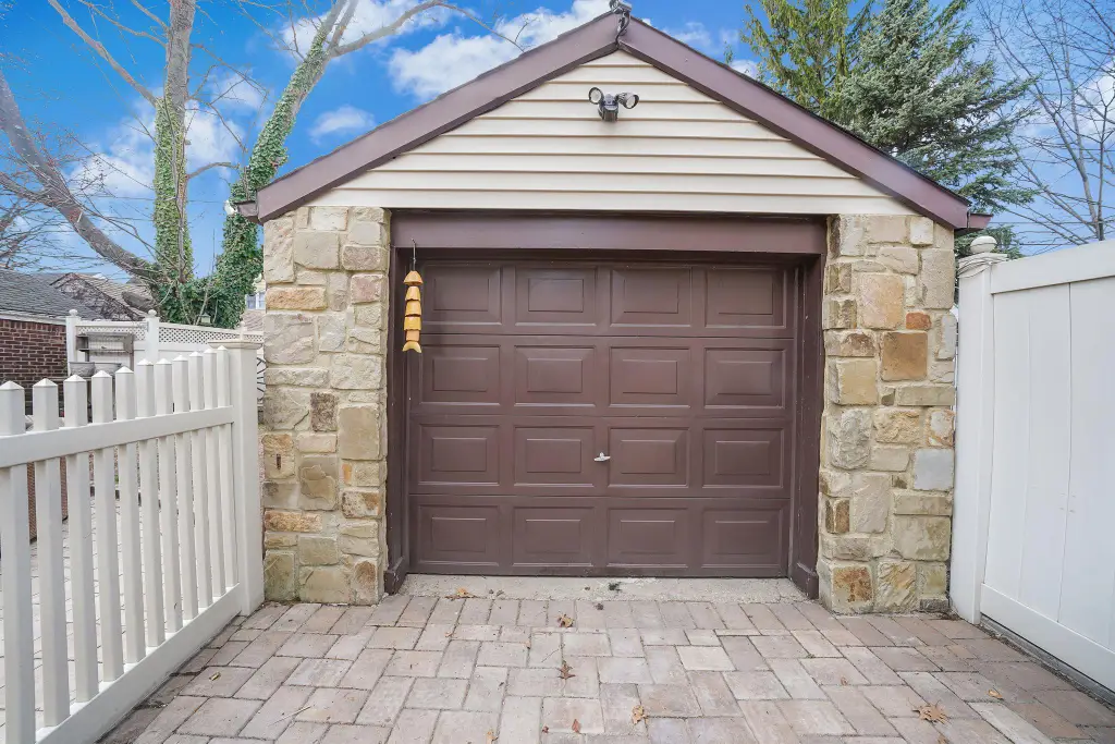 Colonial 3-Bedroom Home with Finished Basement and Detached Garage (1,920 Sq. Ft. Floor Plan)