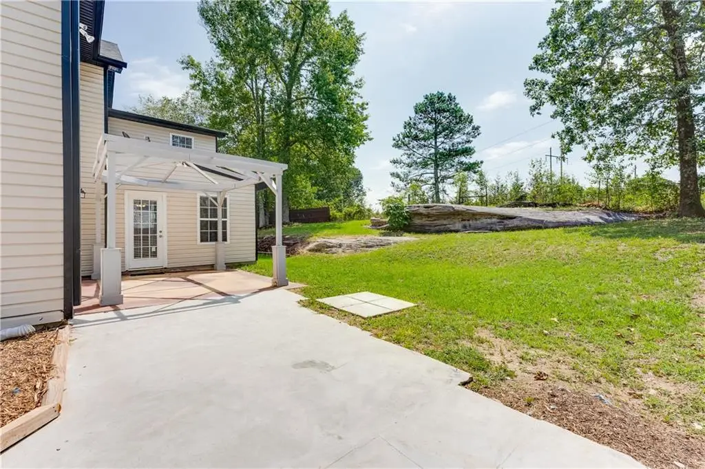Traditional-Style 4-Bedroom Home with Two-Story Foyer and Covered Back Patio (3,310 S. Ft. Floor Plan)