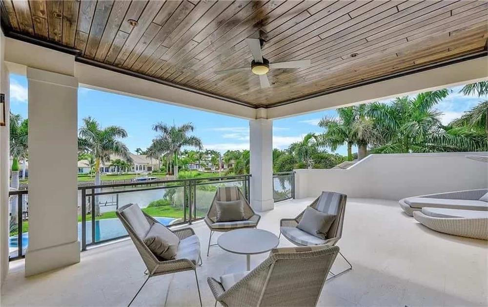 Enjoy the Breeze on This Spacious Balcony Overlooking the Water