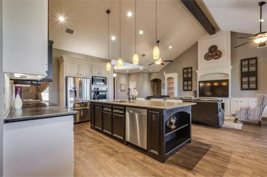 Spacious Kitchen and Living Area with Striking Pendant Lights