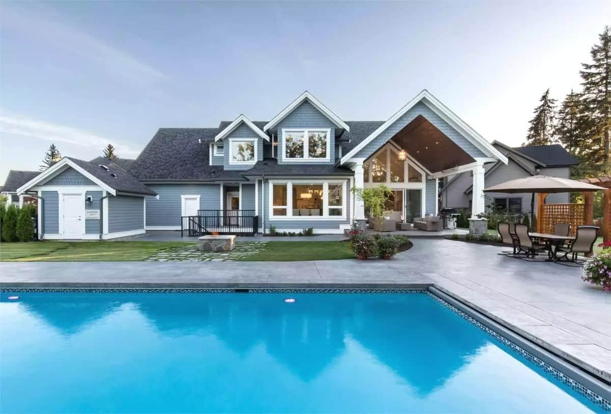 Take in the Open-Air Charm of This Craftsman with a Poolside Patio