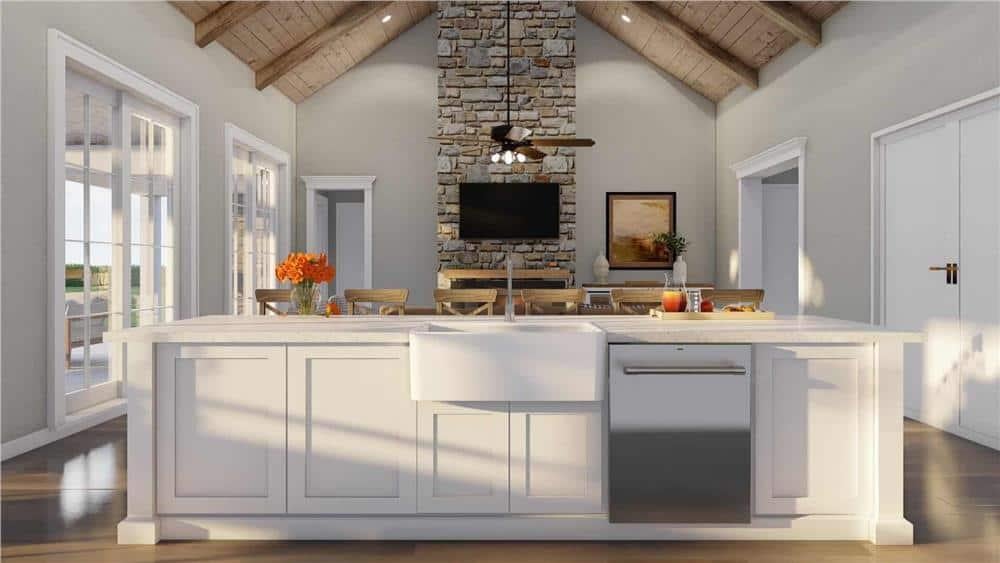Farmhouse Kitchen with Exposed Beam Ceilings and Central Stone Fireplace