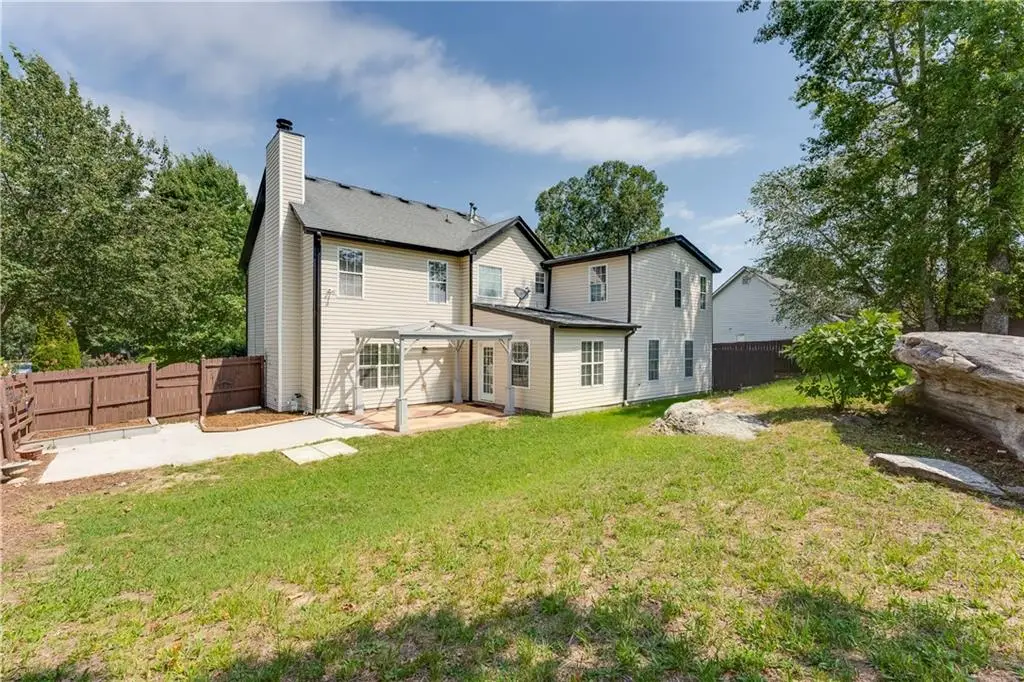 Traditional-Style 4-Bedroom Home with Two-Story Foyer and Covered Back Patio (3,310 S. Ft. Floor Plan)
