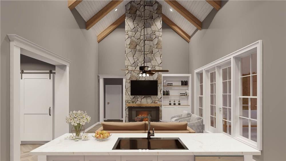 Wow, Look at That Towering Stone Fireplace with Exposed Beams