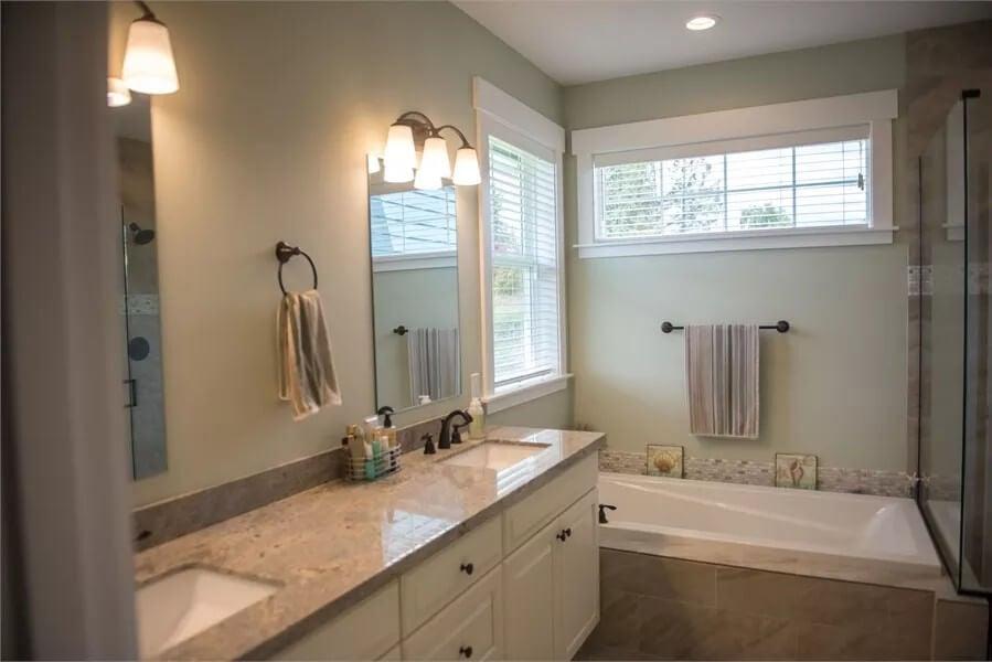 Craftsman Bathroom with Dual Vanity and Soft Green Walls