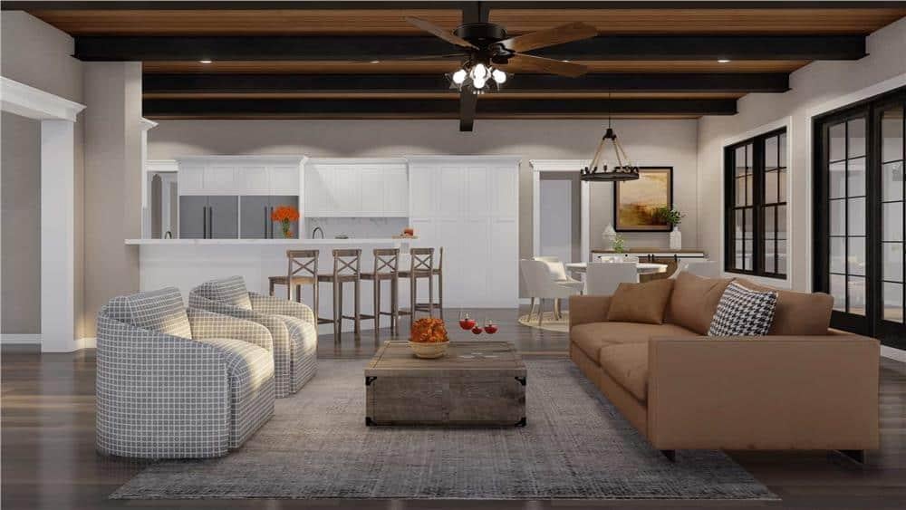 Open Living Area with Exposed Beams and a Seamless Kitchen Connection