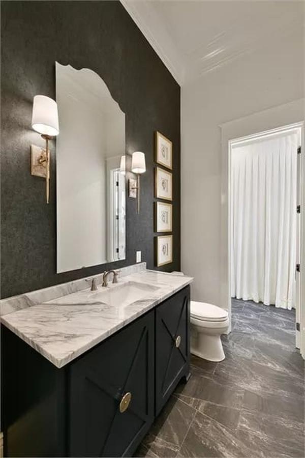 Dark Vanity and Marble Top Create a Stylish Contrast in This Bathroom