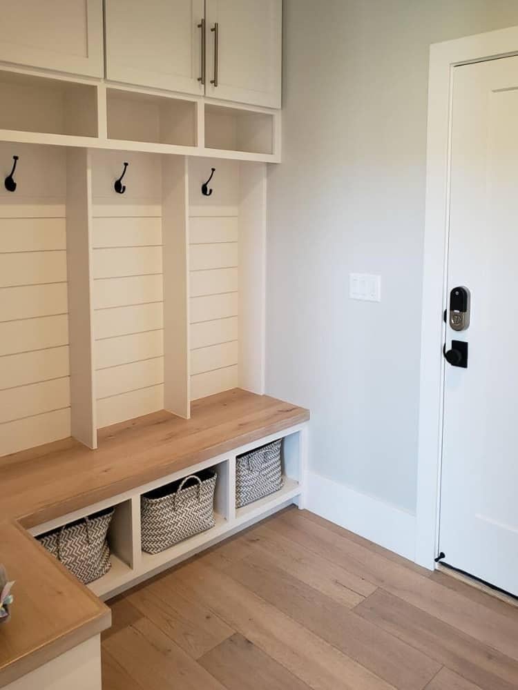 Explore This Tidy Mudroom with Practical Built-In Benches