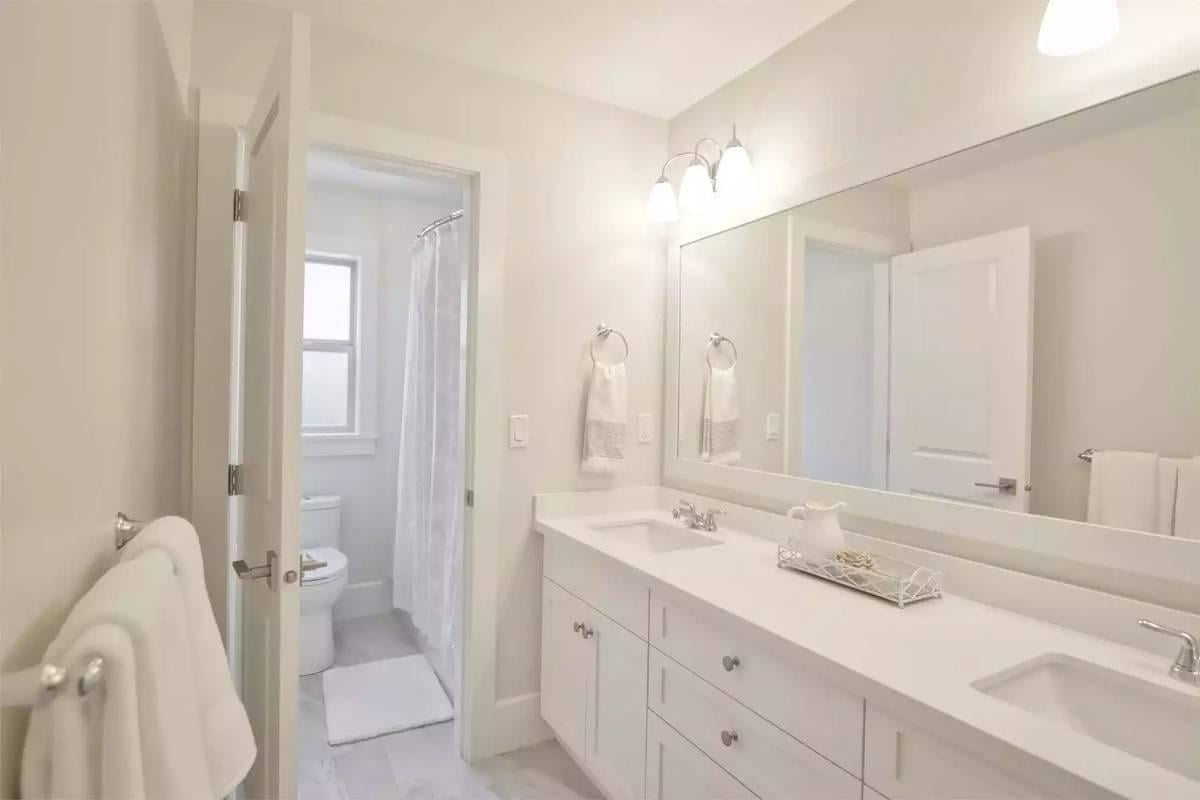 Simple Sophistication in a Bright White Bathroom