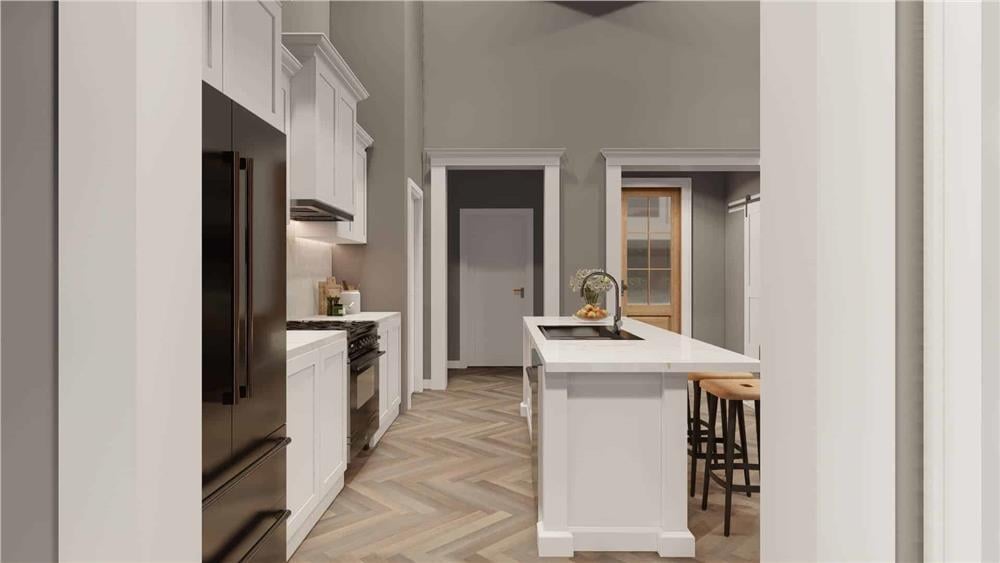 Look at This Sleek Galley Kitchen with Chevron Flooring