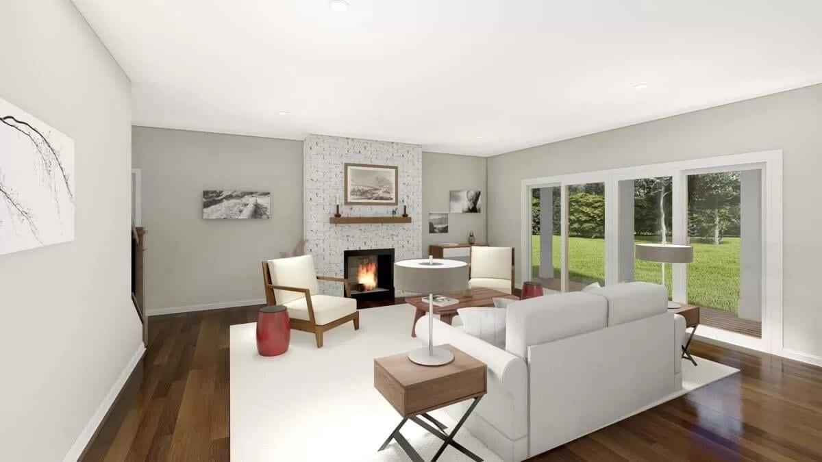 Classic Living Room with Floor-to-Ceiling Brick Fireplace and Serene Views