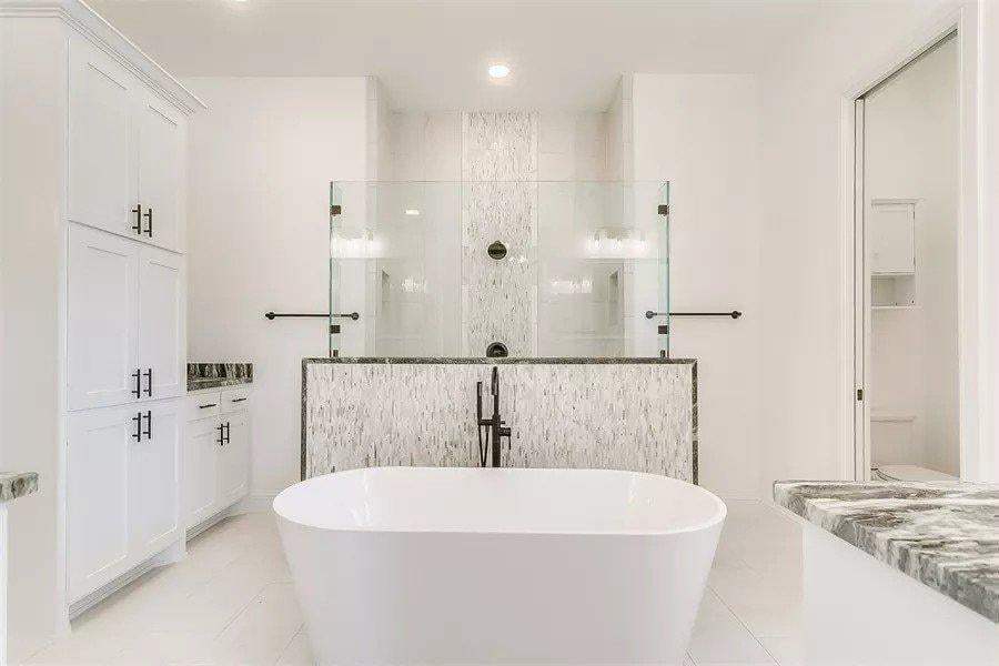 Take in the Freestanding Tub and Striking Tilework in This Master Bath