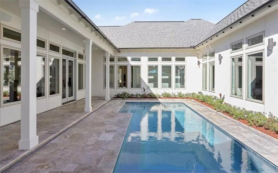 Notice How This Tranquil Courtyard Pool Reflects the Sleek Architecture