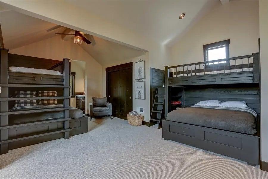 Charming Bunk Room with Stylish Dark Wood Detailing