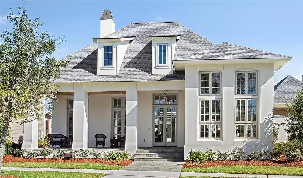 Grand Entrance with Tall Windows and a Gracious Porch