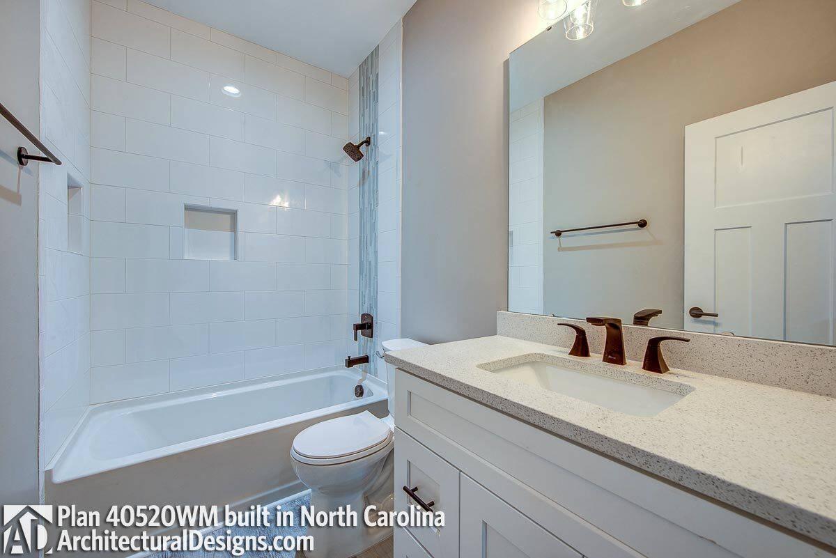 Crisp White Bathroom with Matte Black Fixtures for Contrast