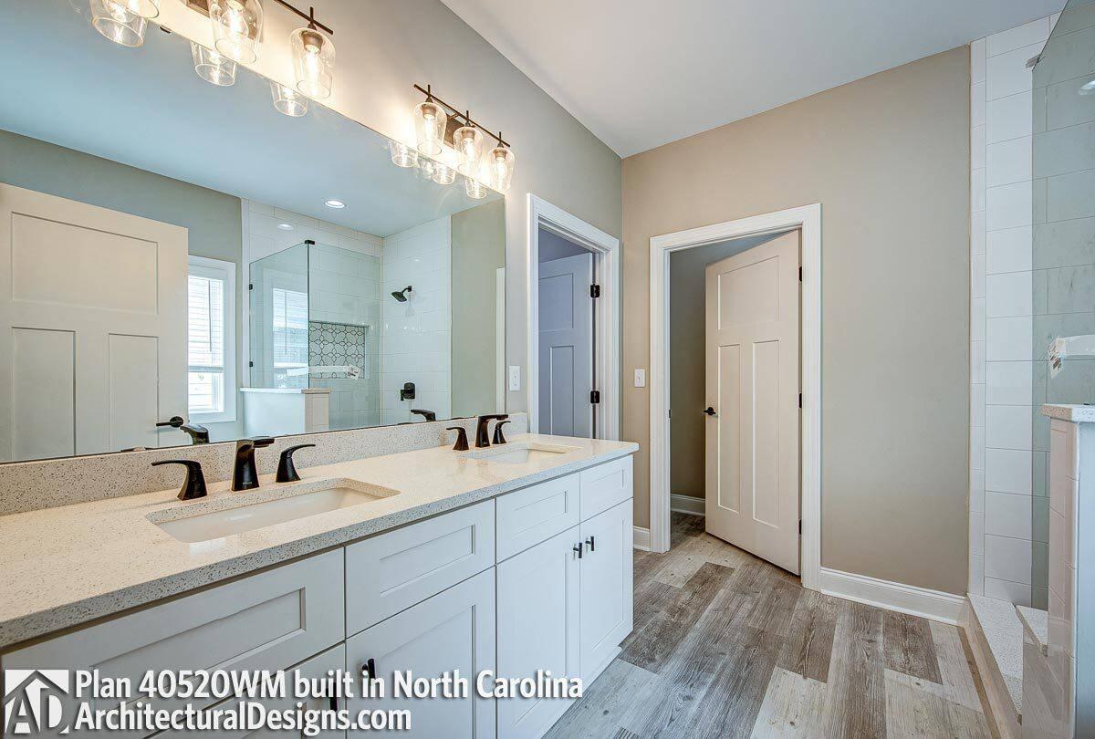 Craftsman Bathroom with Dual Sinks and Sleek Fixtures