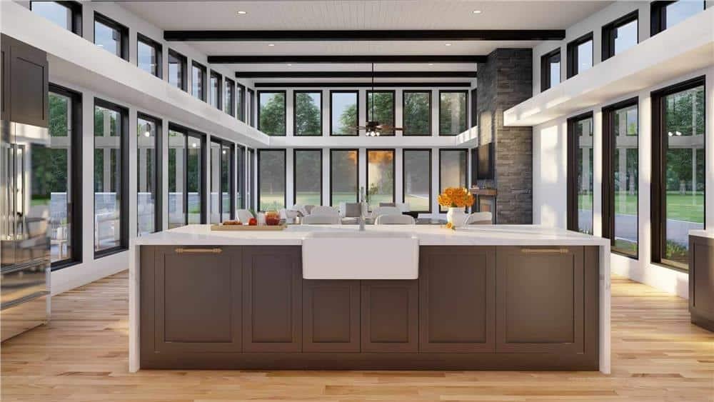 Expansive Kitchen with Central Island and a Wall of Windows