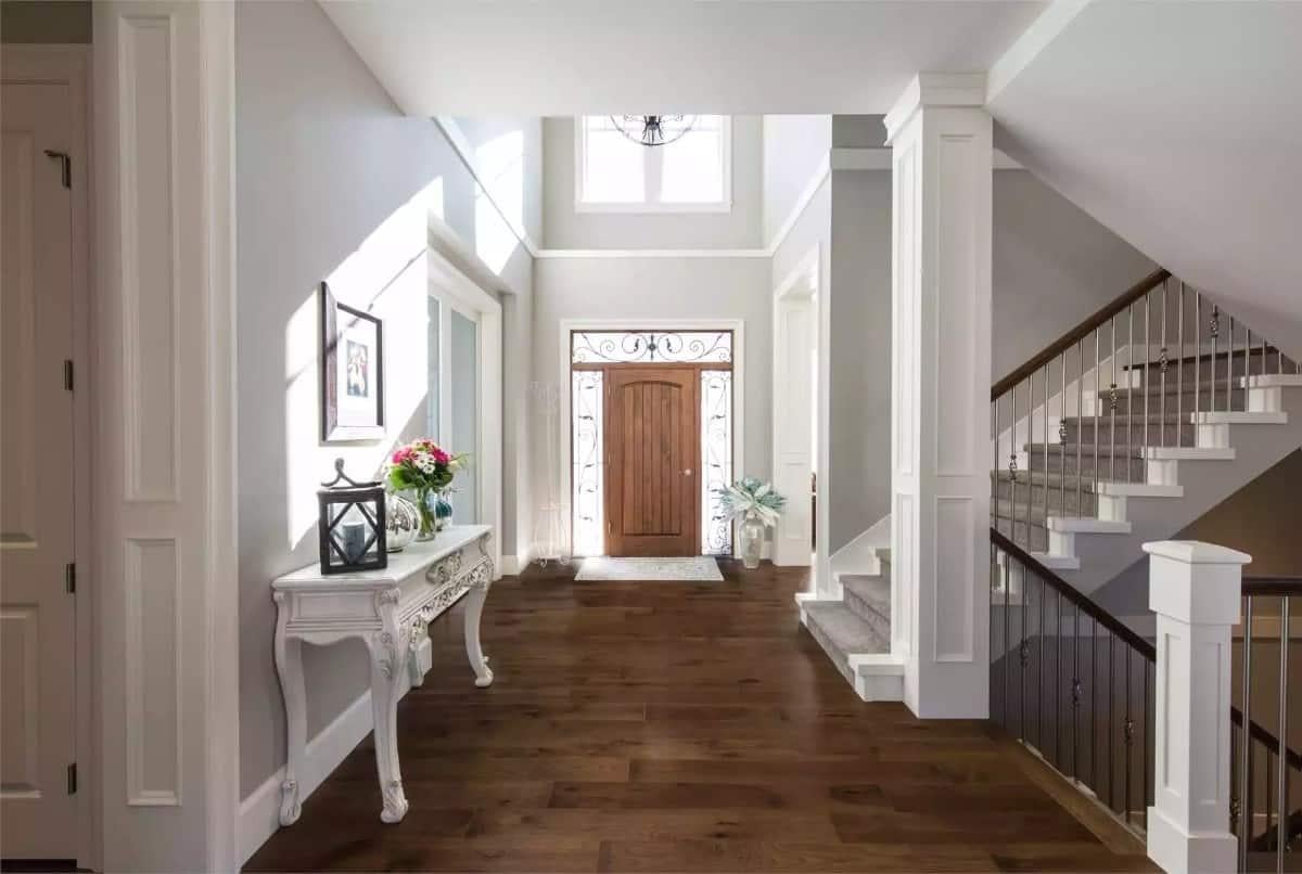 Admire the Classic Entryway With That Stunning Wooden Door