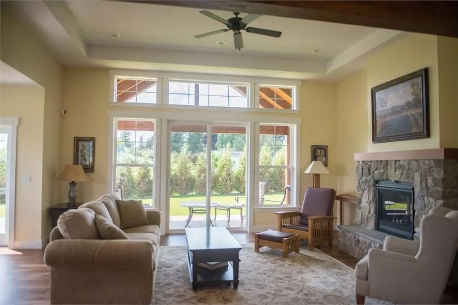 Notice the Stone Fireplace in This Cozy Living Room Setting