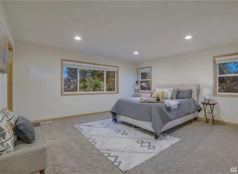 Relax in This Spacious Bedroom with Nature Views