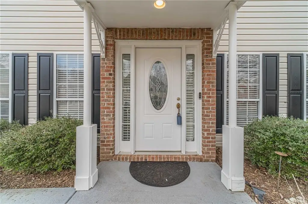 Traditional-Style 4-Bedroom Home with Two-Story Foyer and Covered Back Patio (3,310 S. Ft. Floor Plan)