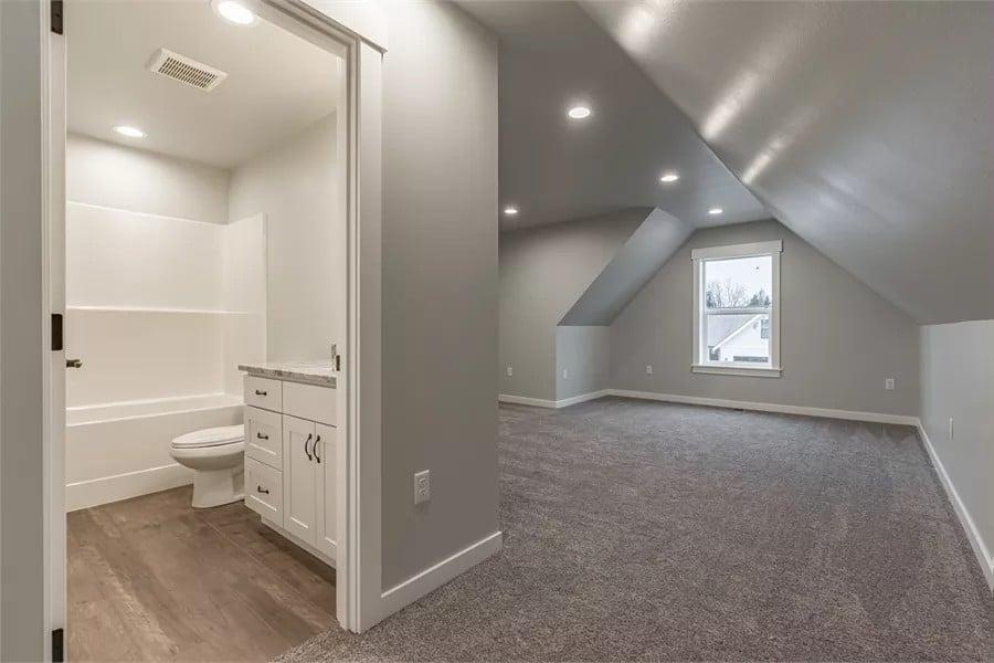 Take a Look at This Versatile Attic Space with a Cozy Nook