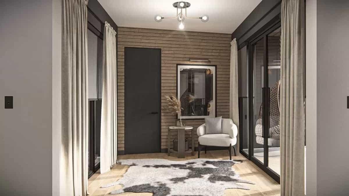 Chic Sitting Nook with Vertical Wood Paneling and Cozy Accents
