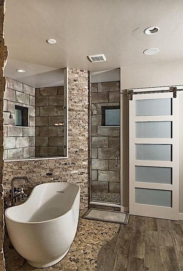 Freestanding Tub Meets Rustic Stone: A Bathroom Oasis