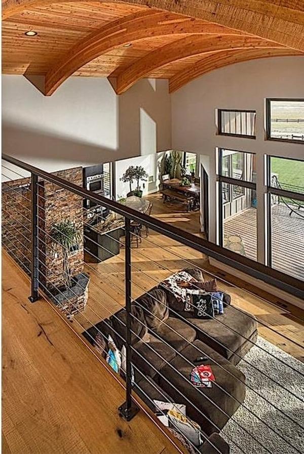 Admire the Curved Timber Ceiling from This Loft View