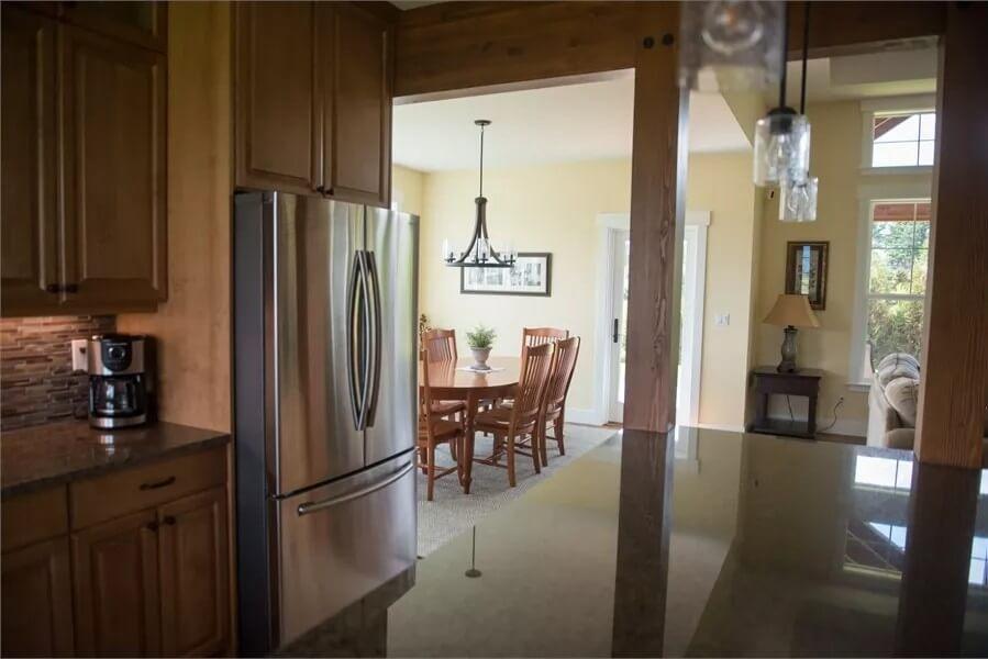 Notice the Elegant Transition from Kitchen to Dining Area