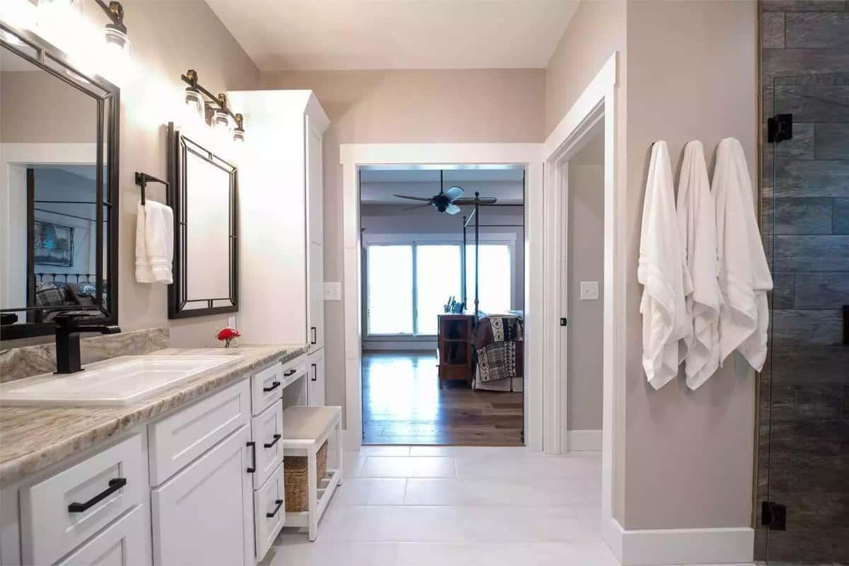 Bathroom Elegance with Double Vanity and Striking Black Fixtures