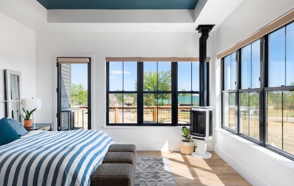 Cozy Master Bedroom with Smart Corner Fireplace Design