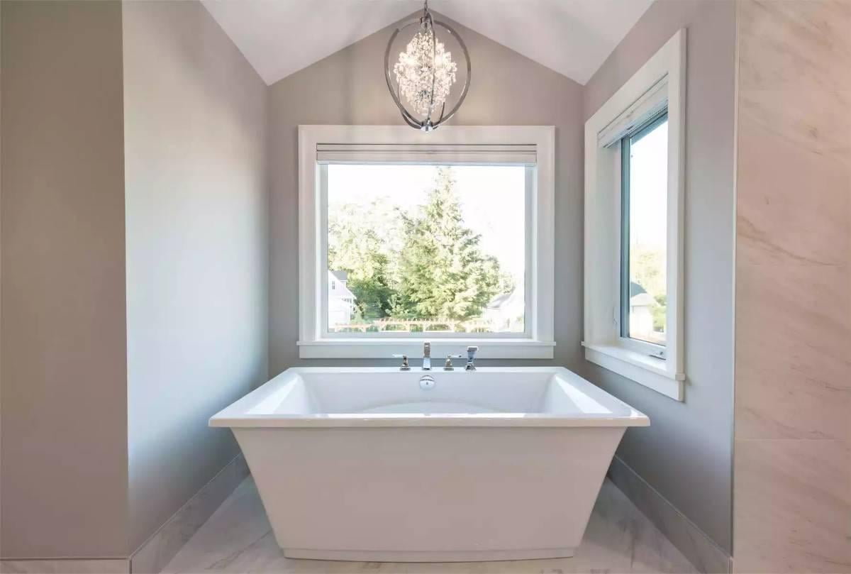 Look at That Freestanding Tub Framed by Expansive Windows
