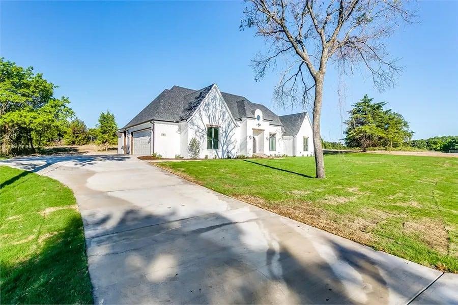 Spacious Driveway Leading to This Elegant Home with a Dormer