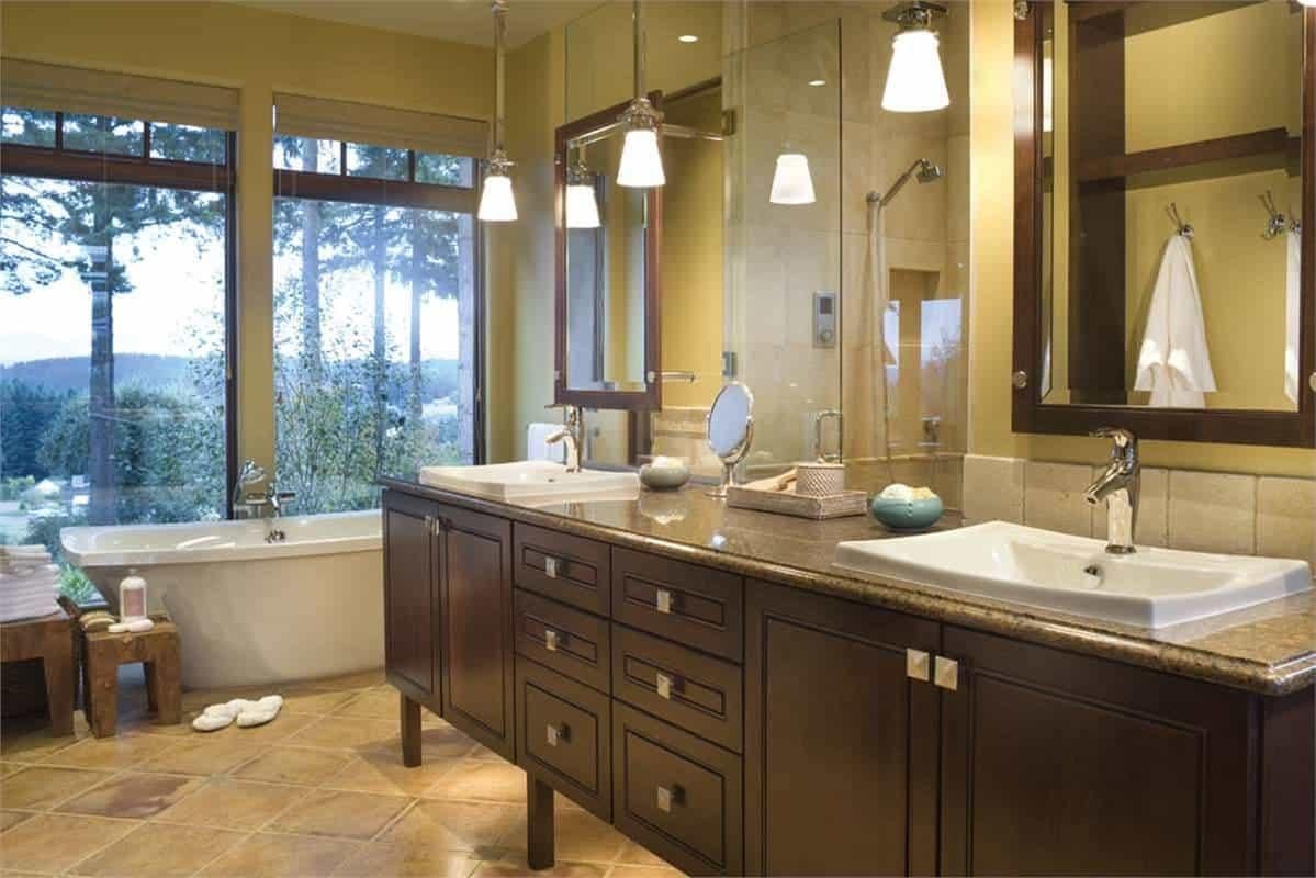 Serene Bathroom with Double Vanity and Forest Views