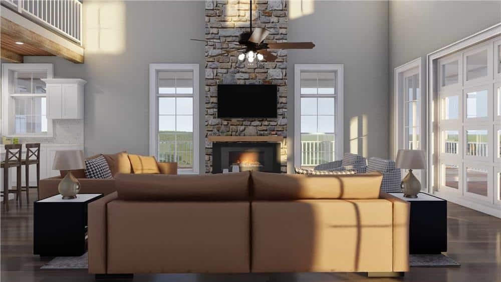 Spacious Living Room Featuring a Tall Stone Fireplace