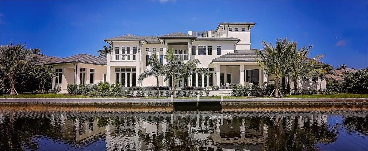 Look at That Canal-Side Beauty with Expansive Windows