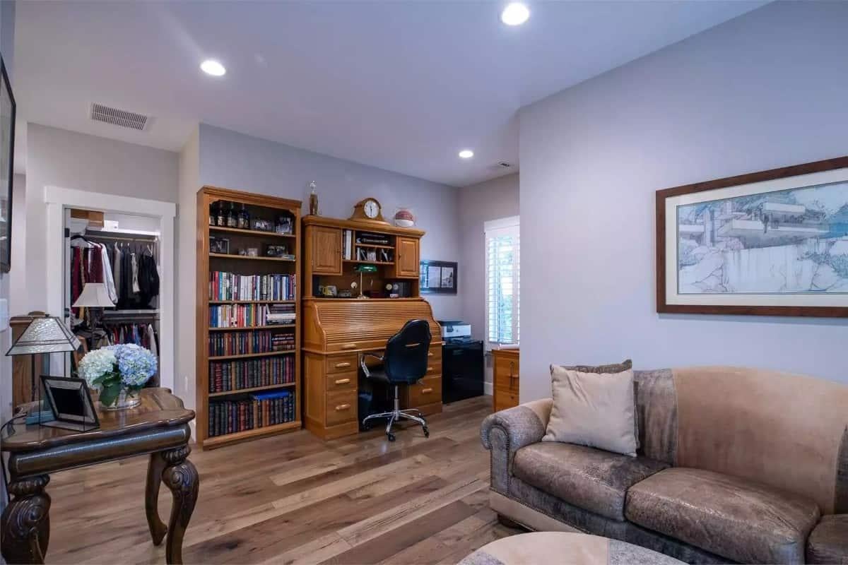 Classic Home Office with a Roll-Top Desk and Built-In Bookshelves