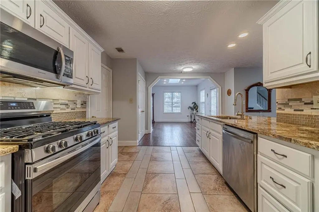 Traditional-Style 4-Bedroom Home with Two-Story Foyer and Covered Back Patio (3,310 S. Ft. Floor Plan)