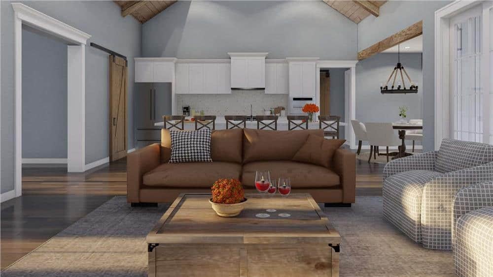 Check Out the Open Floor Plan with Vaulted Ceiling and Barn Door Detail