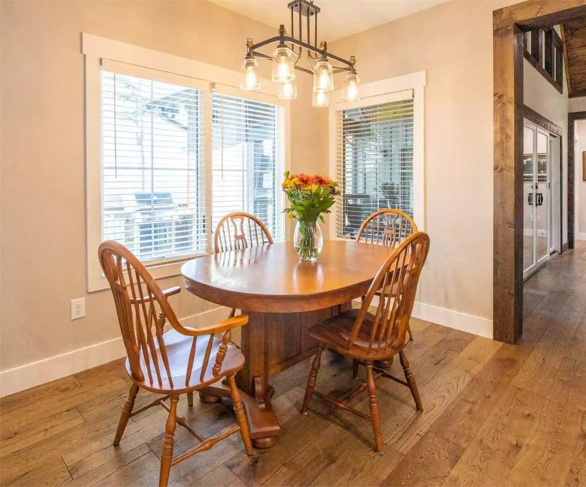 Cozy Dining Nook with a Charming Round Table and Rustic Lighting