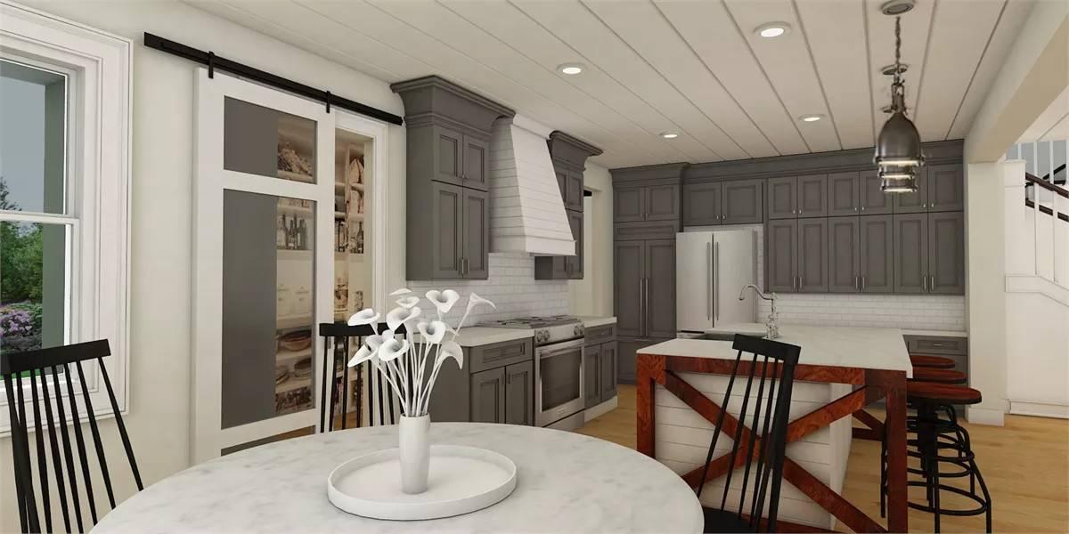 Craftsman Kitchen Highlighting Chic Dark Cabinetry and Double Sliding Pantry Doors