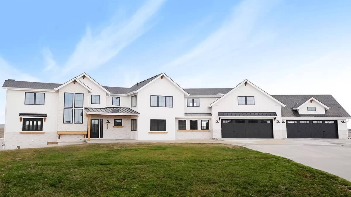 Modern Farmhouse with Striking Black Garage Doors