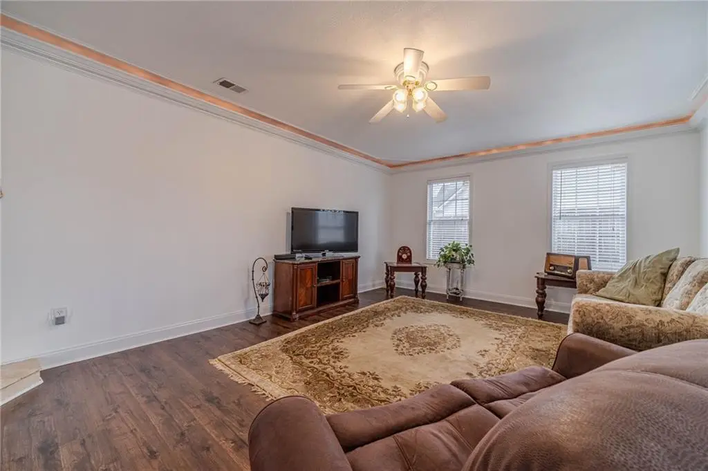Traditional-Style 4-Bedroom Home with Two-Story Foyer and Covered Back Patio (3,310 S. Ft. Floor Plan)