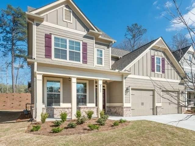 Check Out the Classic Burgundy Shutters Against the Craftsman Siding