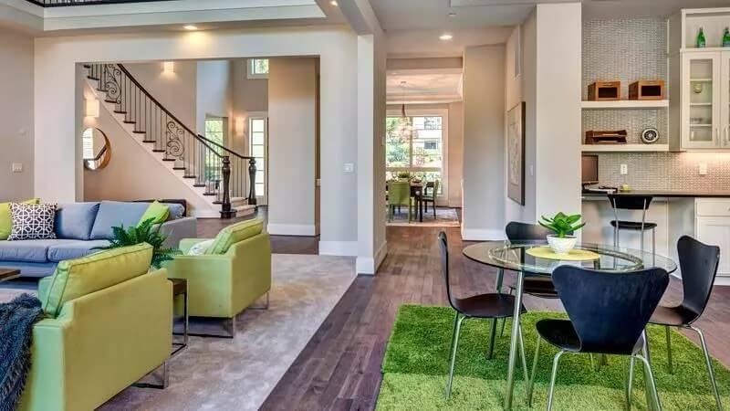 Spot the Bright Green Accents in This Open-Concept Living Room
