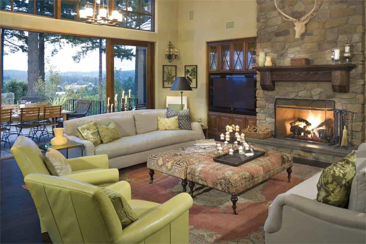 Wrap Yourself in Warmth by This Stone Fireplace in a Picturesque Living Room